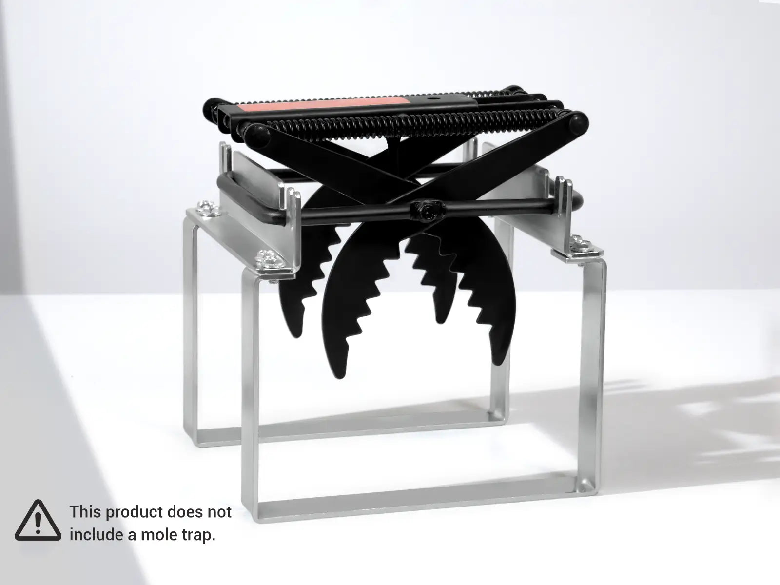 Black jagged mole trap on the releaser, you can release the mole hand-free
