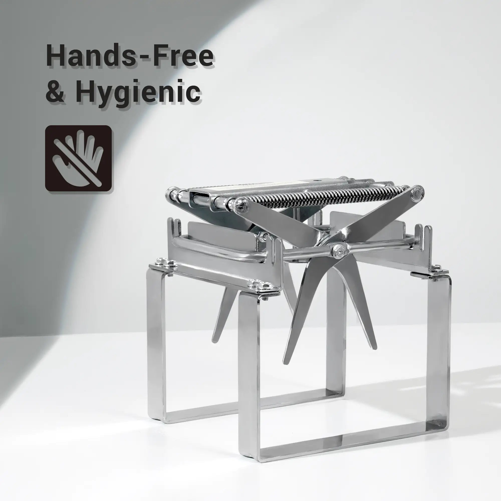 Metallic mole trap and release on a white background with 'Hands-Free & Hygienic' text and icon.